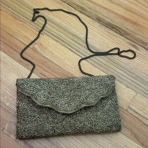 Gold occasion bag with removable gold chain